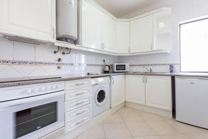 calm beach apartement Portimao Bagian luar foto